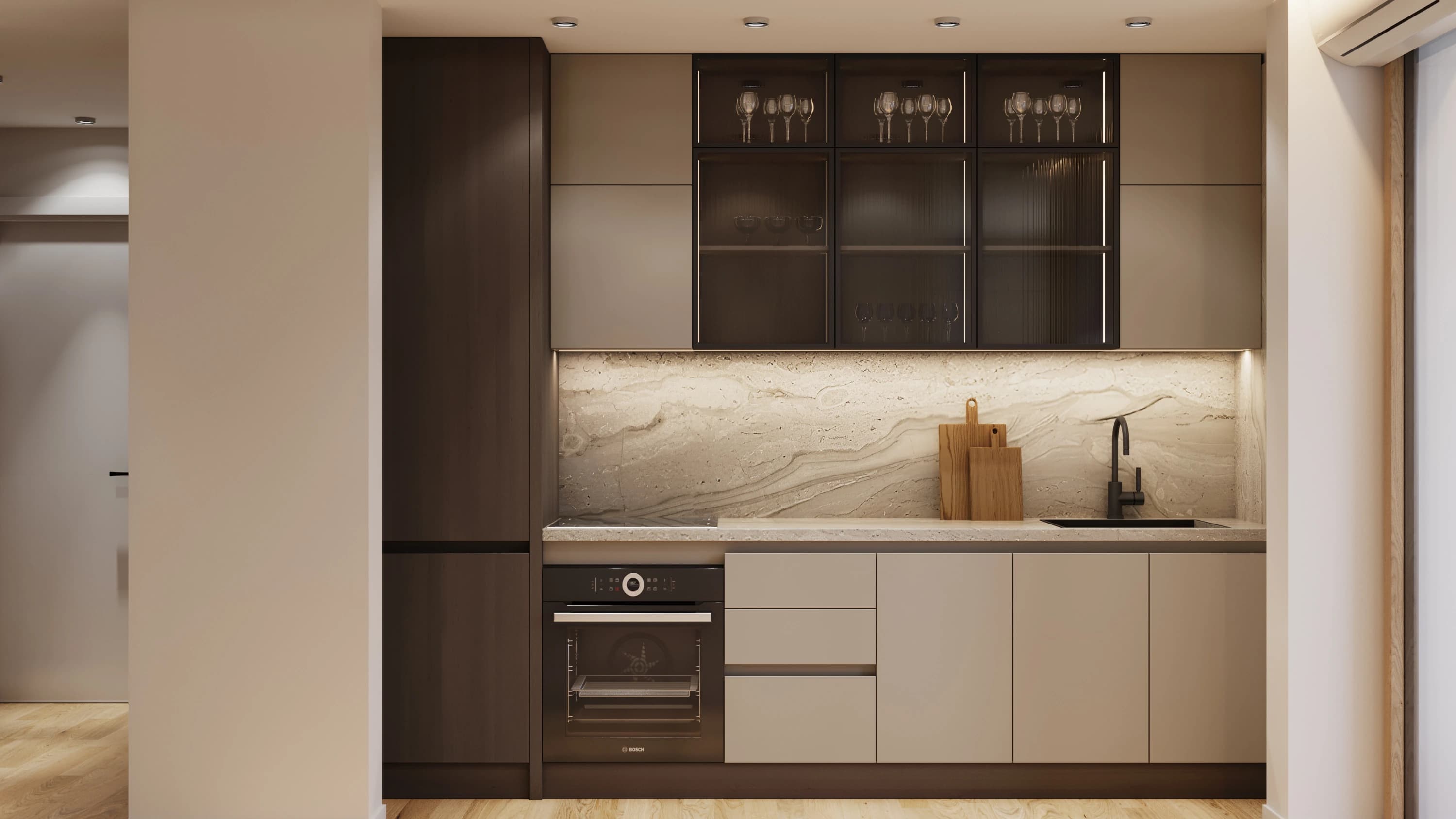 Kitchen of the Open plan apartment: dark wood and taupe cabinets, smoked-glass wall units and a veined stone backsplash